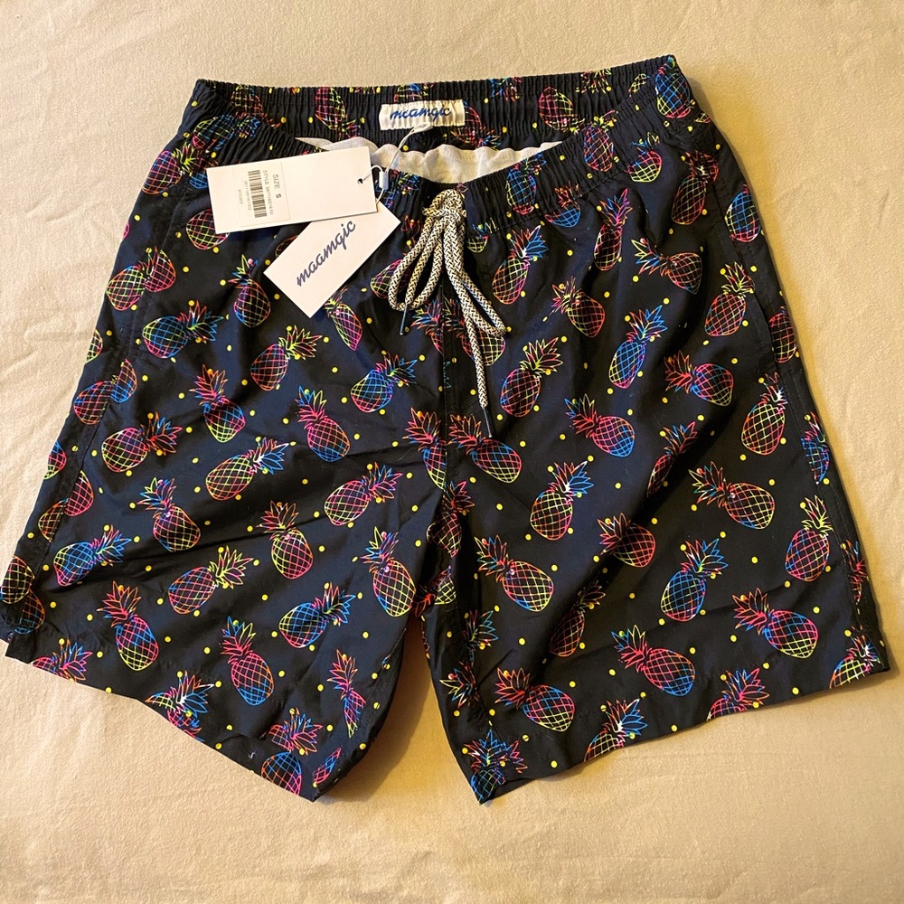 Never worn new with tags unique pineapple swim shorts